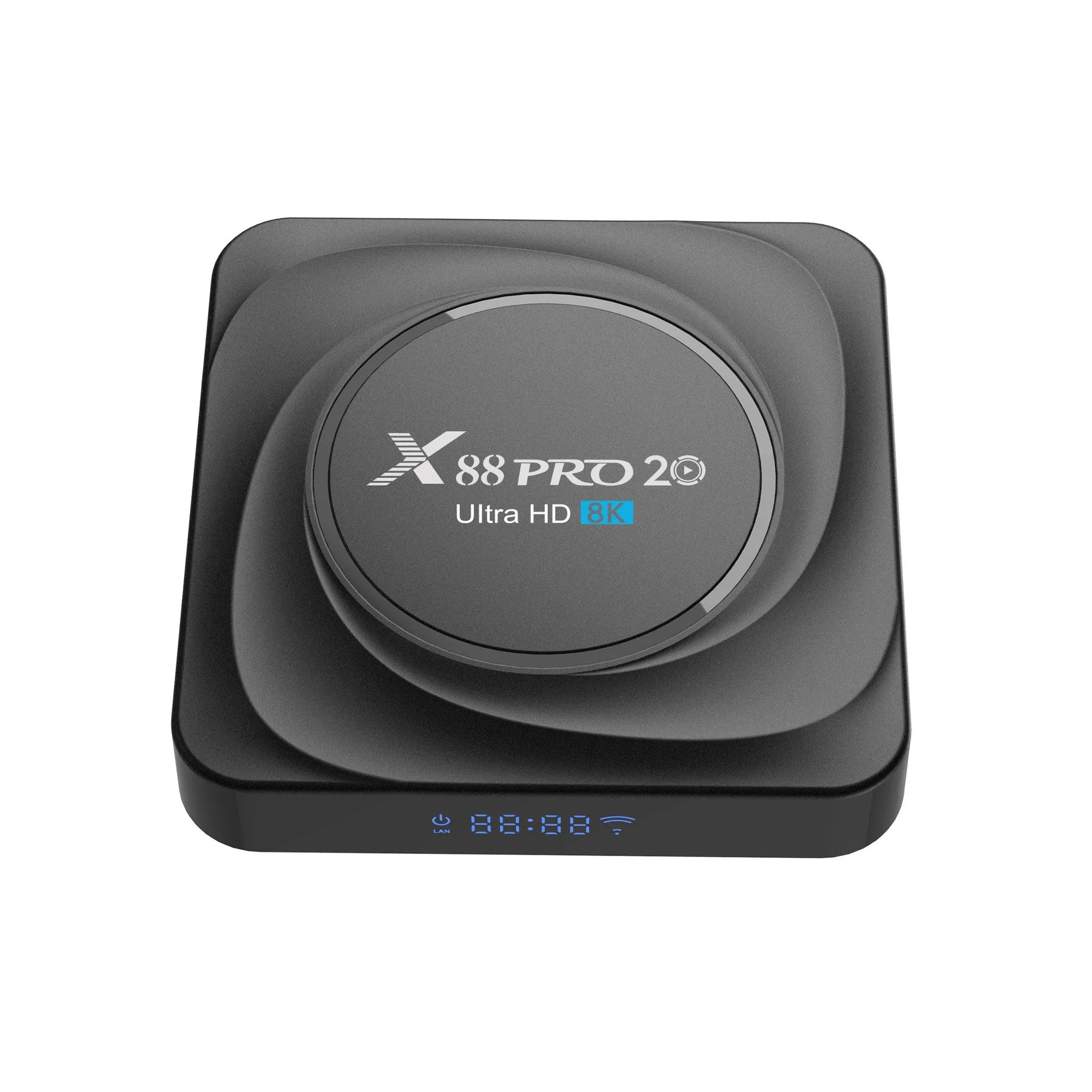 Android set-top TV box with remote control on a wooden surface