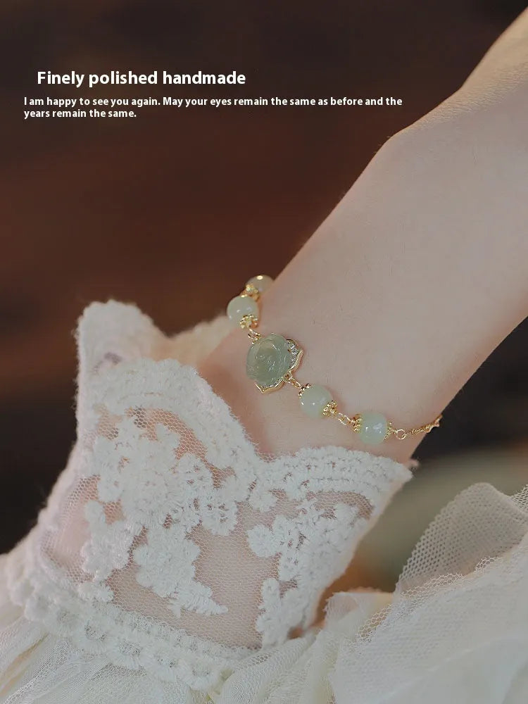 Original national-style women's bracelet with Hetian jade rose motifs and 14K gilded accents