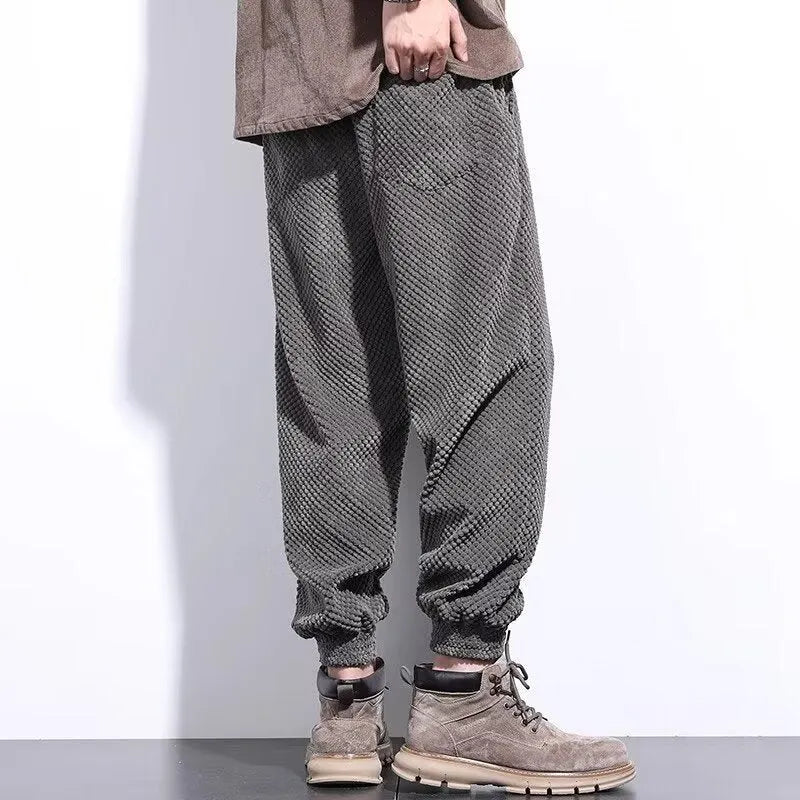 Men's grey ankle-tied casual sweatpants with straight leg cut and adjustable fastening