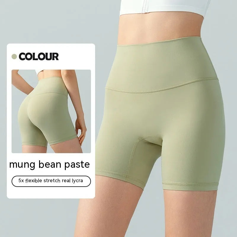 Women's leaf green Lycra yoga shorts with high waist belly control design