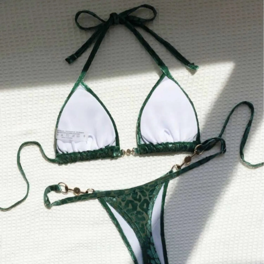 Women's blue leopard print T-shaped swimwear bikini set made from polyester and spandex fabric.