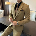 Men's slim fit business formal wear jacket in a dark green colour, showing structured blazer design.