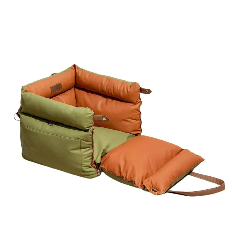 Green waterproof dog car nest bed with sides, showing removable design for washing, placed in a car boot.