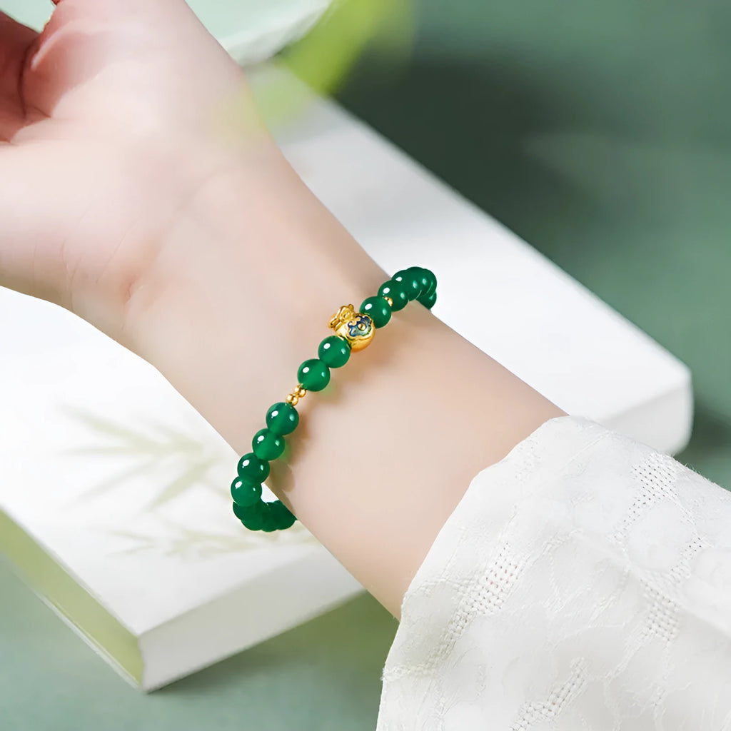 Green turquoise bead bracelet with 8mm geometric beads and silver accent