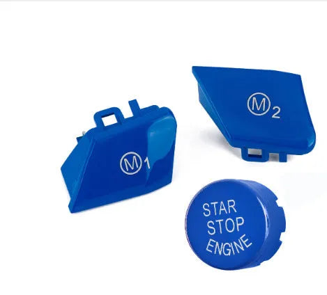 Pair of red and blue M1M2 steering wheel mode buttons for BMW F30 and F34 models with installation keys.