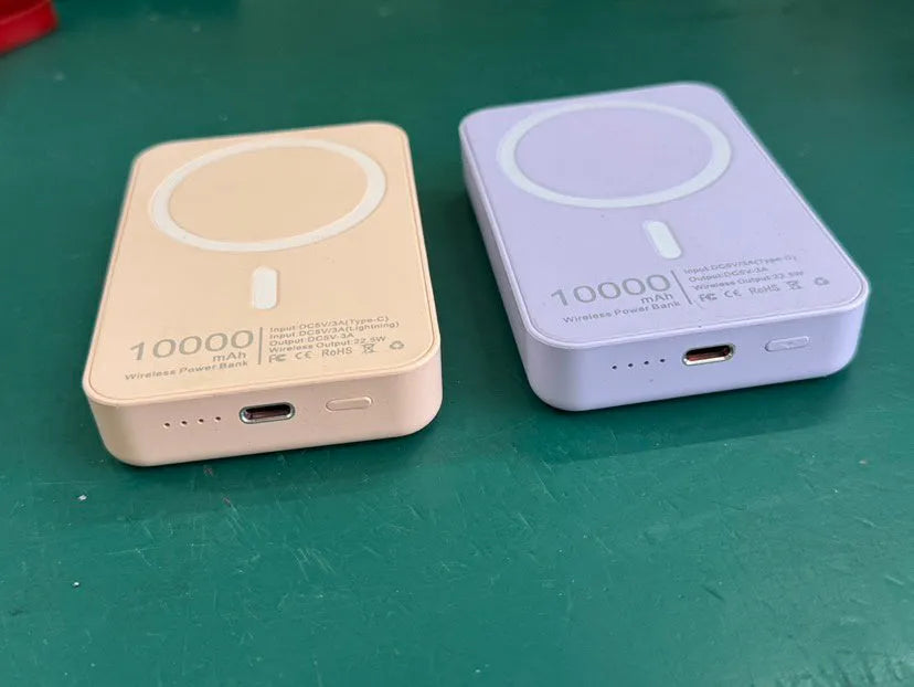 Magnetic wireless charger power bank with creative PVC design showing pink, purple, and white colour options