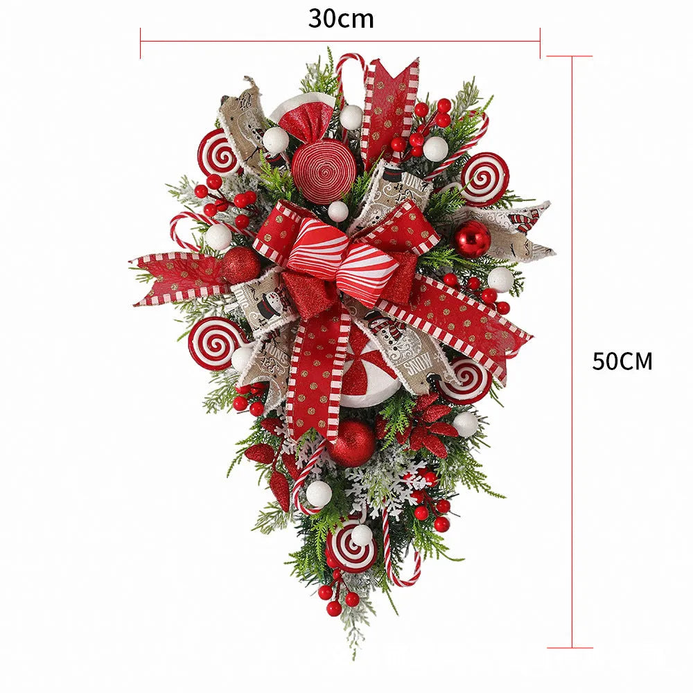 Artificial Christmas wreath with candy and upside-down tree design, 50cm or 60cm, yellow ribbon loops for hanging.
