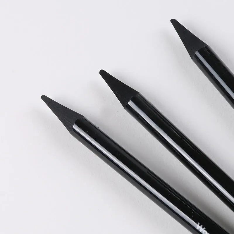 Wooden case containing six graphite pencils and three carbonized pencils for drawing, presented on a white suction card.