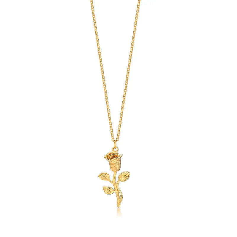 Stainless steel gold roses necklace for men with cross pendant and polished chain on display