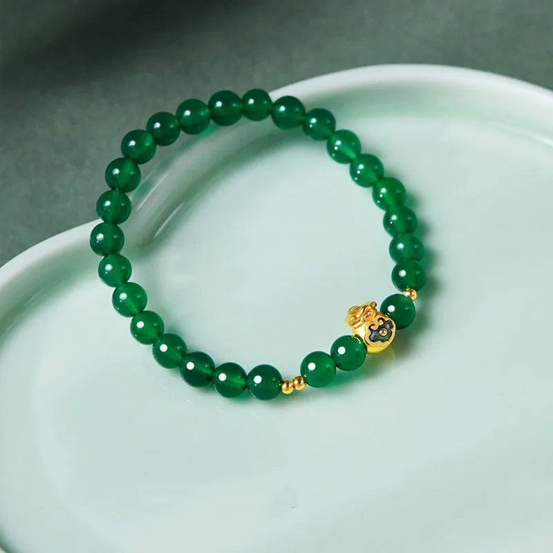 Green turquoise bead bracelet with 8mm geometric beads and silver accent
