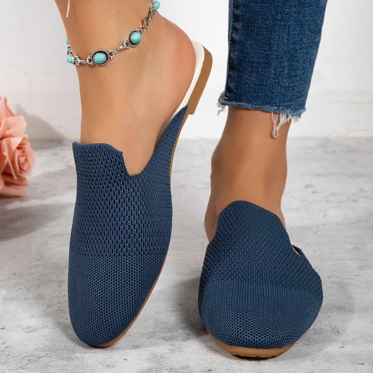 Women's apricot mesh slip-on sandals with round toe and rubber sole on a plain background.