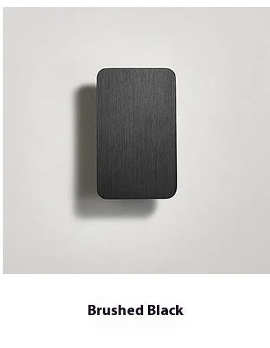Minimalist Nordic design LED wall lamp in black finish showing clean lines and integrated light source