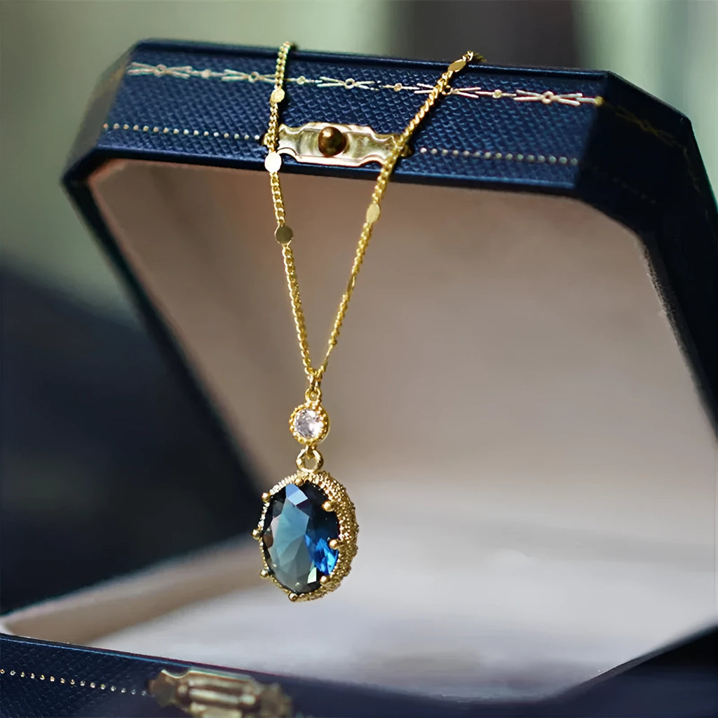 Gold geometric French retro copper necklace on a model, showing its electroplated finish.
