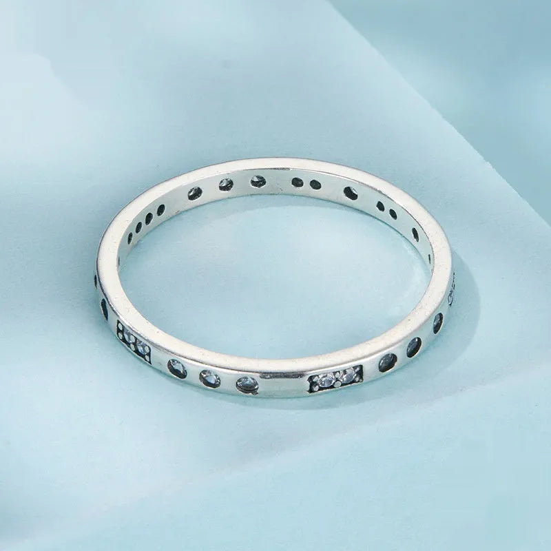 Moss Password I Love You silver alloy ring with oxidised black finish, shown in women's sizes.