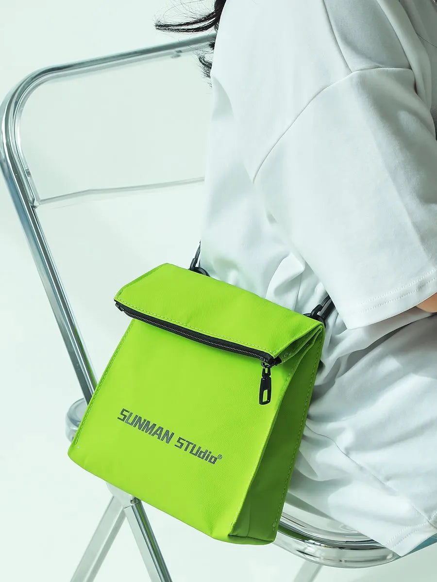 Simple all-match messenger bag backpack in polyester with adjustable crossbody strap, showing sewing line detail