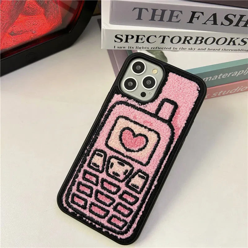 Pink TPU iPhone back cover case with a textured towel embroidered design.