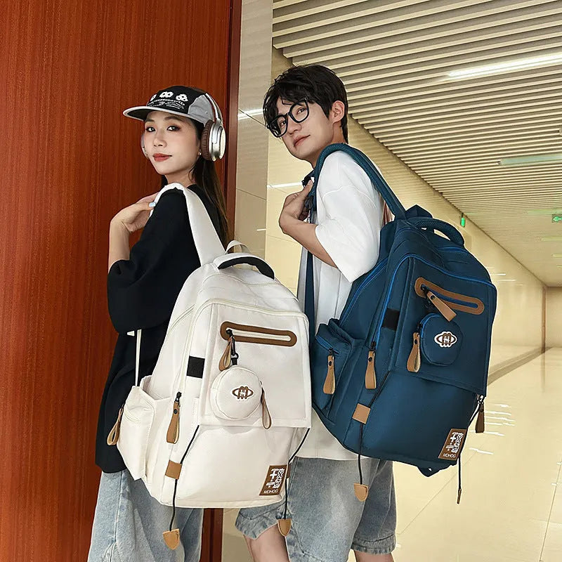 Large waterproof nylon leisure travel backpack in multiple colours with contrast stitching details