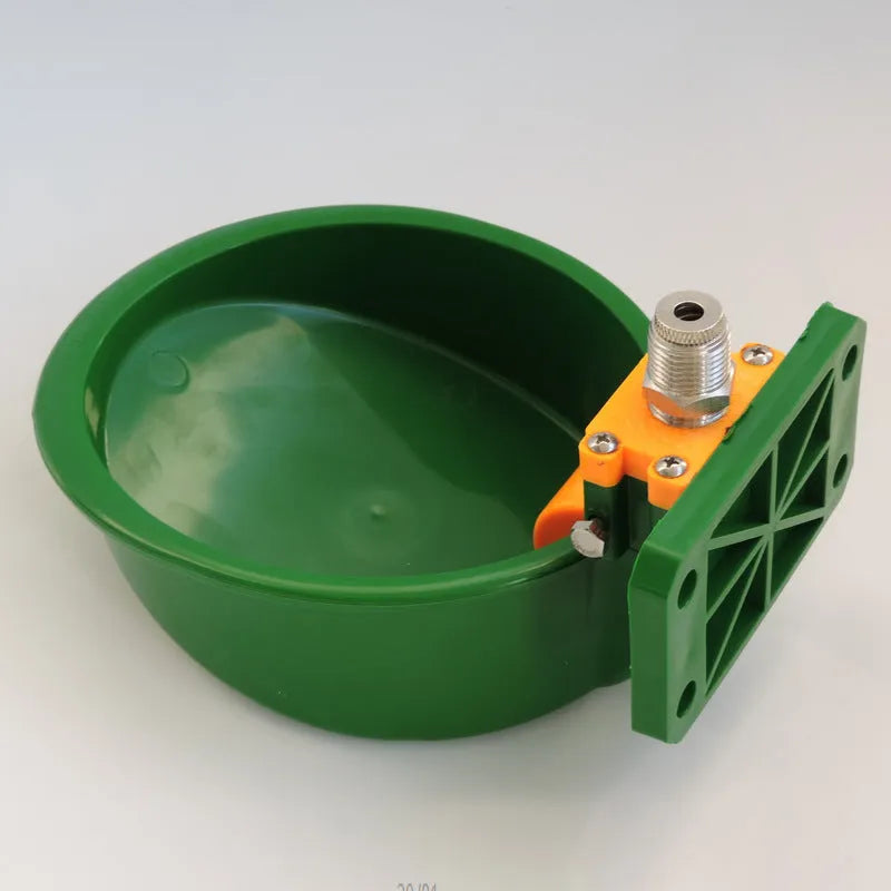 Green plastic livestock drinking bowl with water nozzle for sheep and pigs