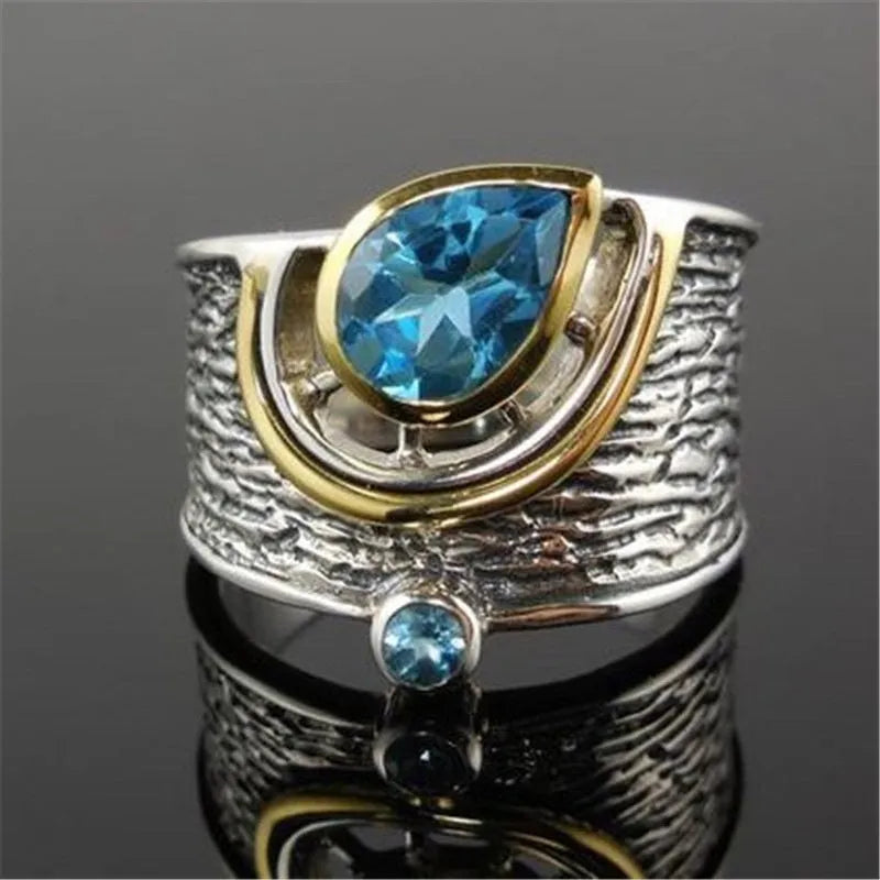 Blue Chinese-style alloy women's ring with inlaid zircon rhinestones in a drop shape.