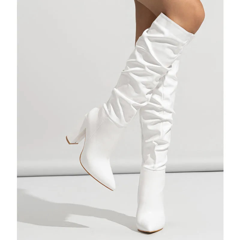 Women's pointed toe high heel boots in white with side zip closure and 8cm+ heels