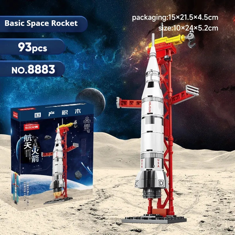 Colour box packaging of space rocket building blocks featuring space station, starship, Apollo 5, Falcon Heavy rocket, and dragon flying ship sets