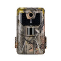 Compact camouflage trail camera with infrared LEDs, showing front display and lens.