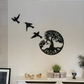 Black iron wind chime wall hanging with a modern simple design, shown as a decorative ornament.