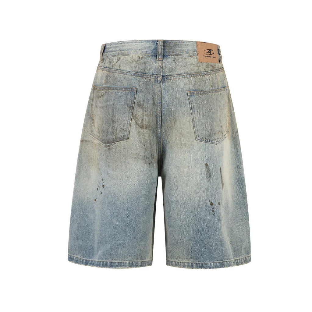 Blue cropped washed denim middle pants with a straight leg and zipper fly on a model.