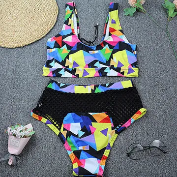 Women's multicolour checkered bikini set with cross-strap top and fishnet high-waist shorts