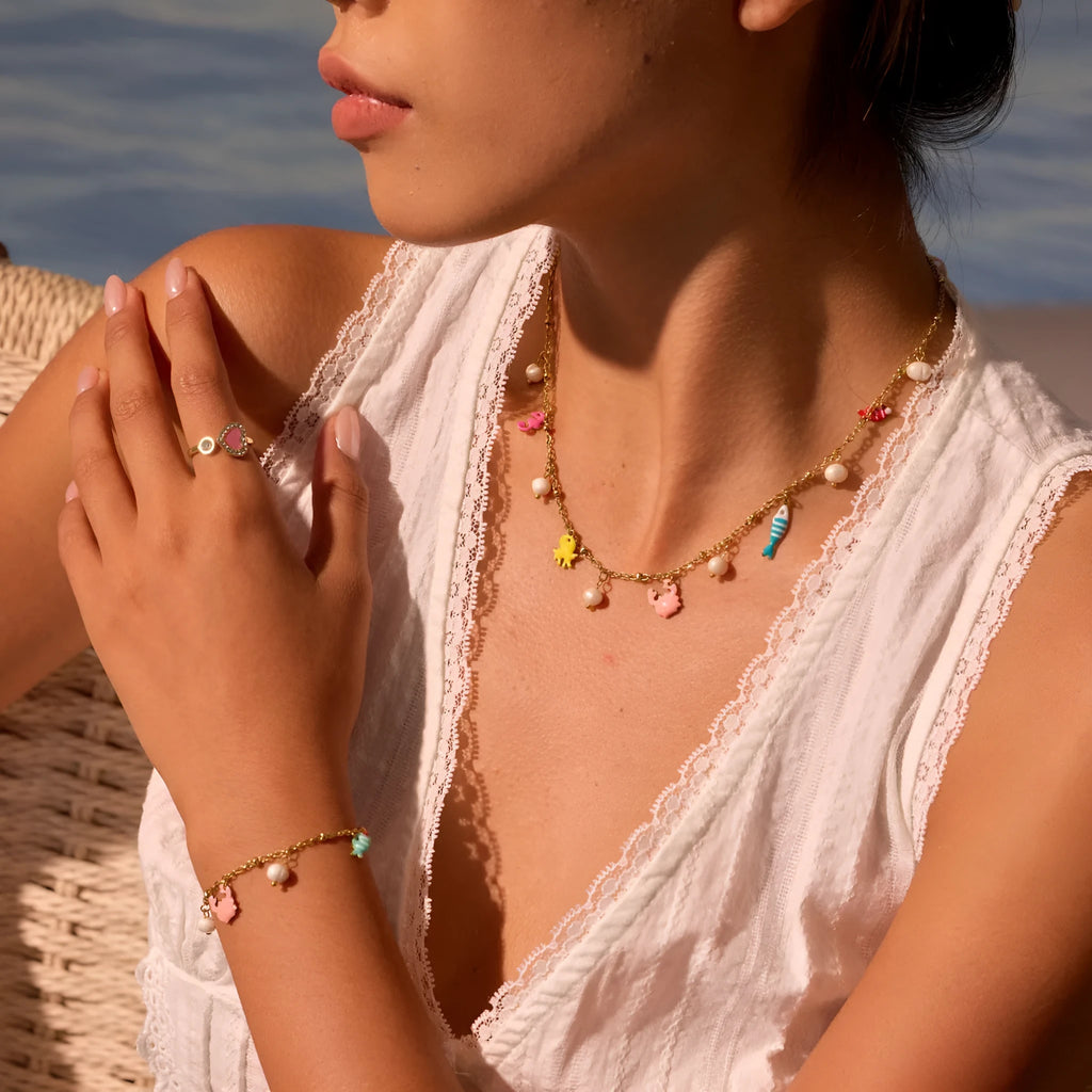 Stainless steel geometric pendant necklace with 18K gold-tone electroplating on a regular chain, model NMSBJ7464