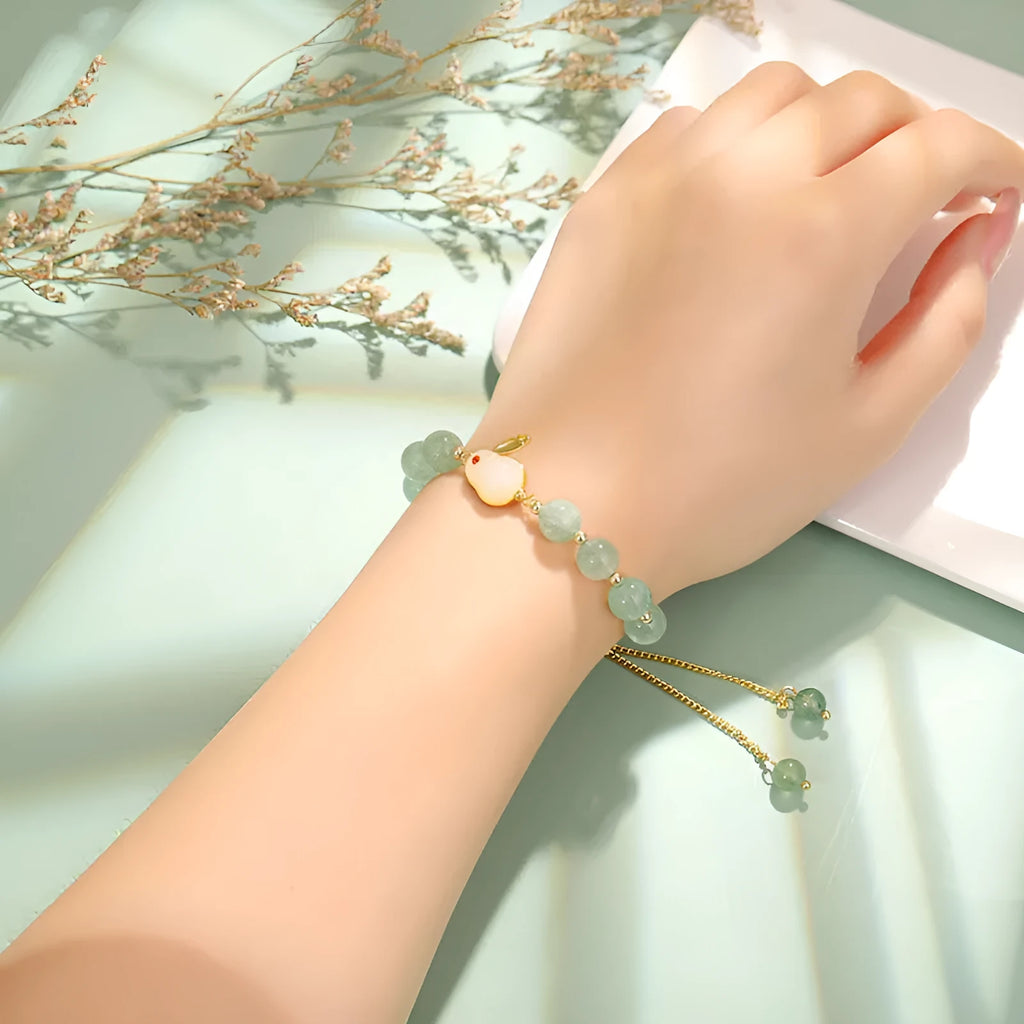 Rabbit bracelet with green aventurine and strawberry quartz beads, copper and gold-plated details
