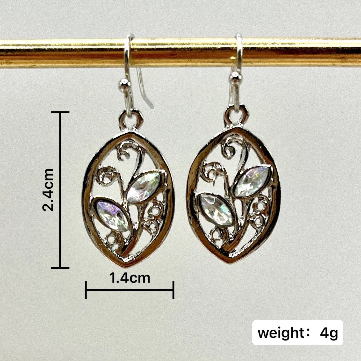 Silver leaf-shaped drop earrings with colourful moonstone centrepieces for women