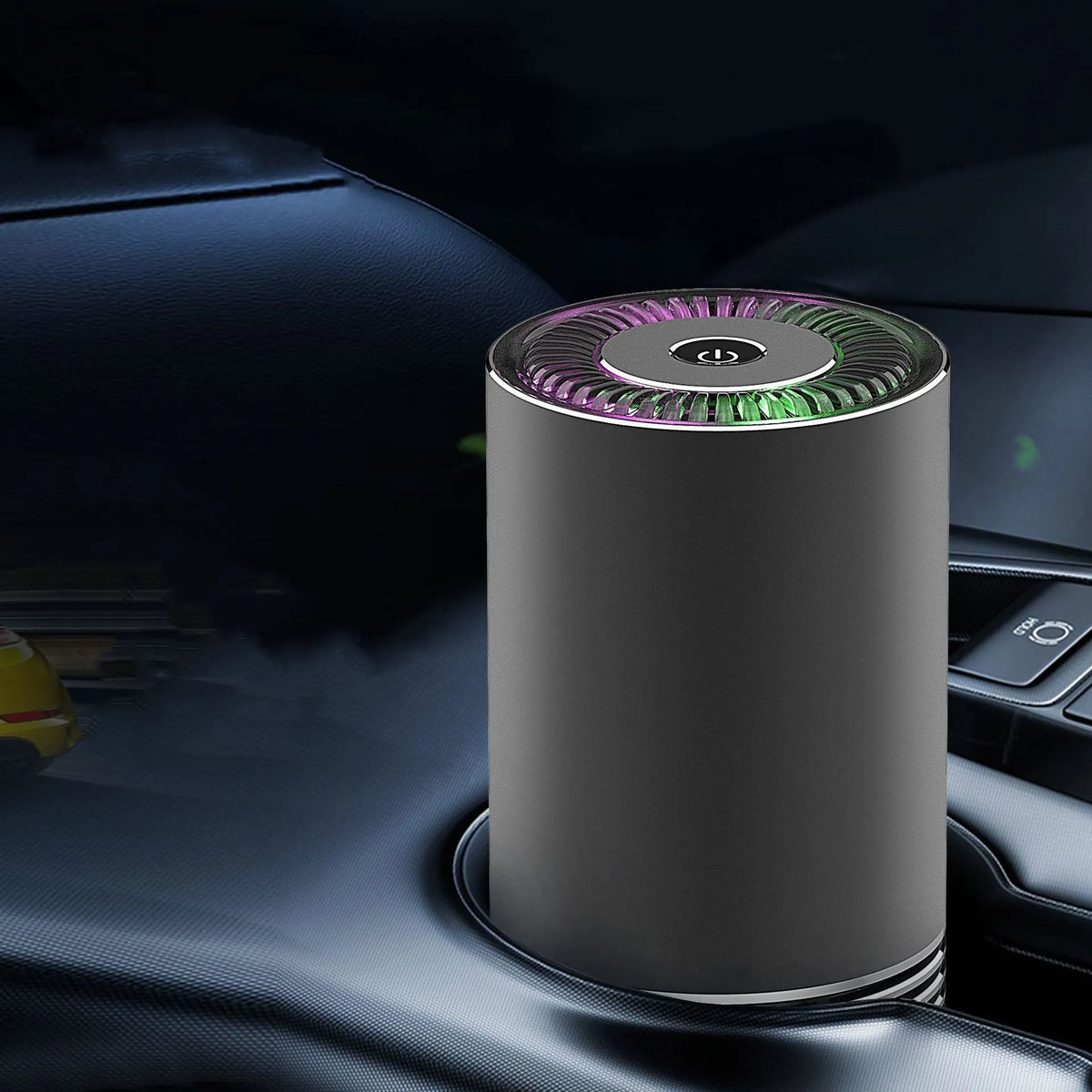 Compact black car and desktop air purifier with aluminium alloy case on a wooden desk.