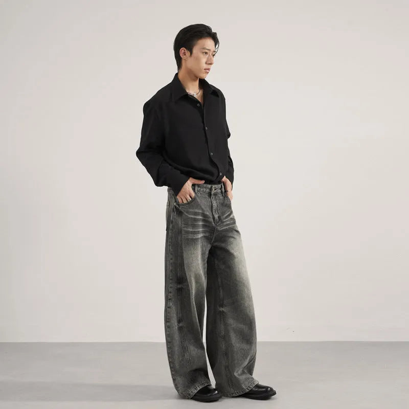 Men's denim straight leg jeans in black and gray washed finish with zip fly