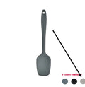 Black silicone kitchen utensil set with 12 tools stored in a rotating plastic storage bucket on a worktop.