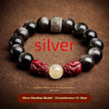 Cinnabar beads bracelet with hand-carved gold animal zodiac charms in cartoon retro style