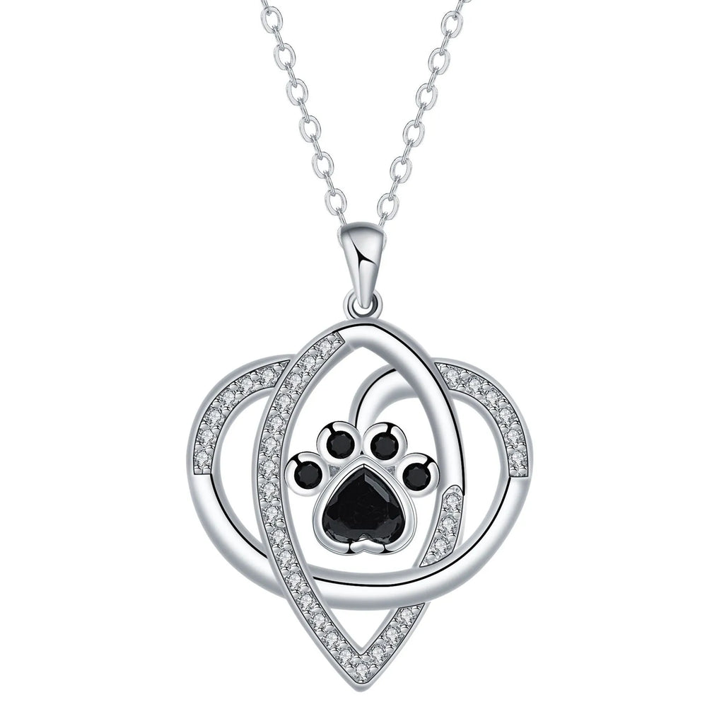 Gold necklace with cat and dog paw prints pendant on cross chain