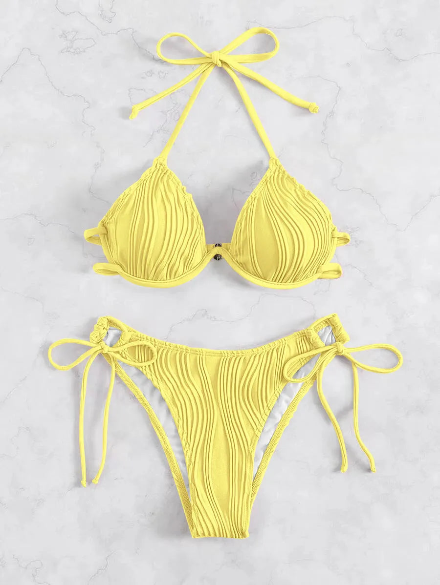 Women's apricot coloured bikini set with underwire cups and adjustable ties.