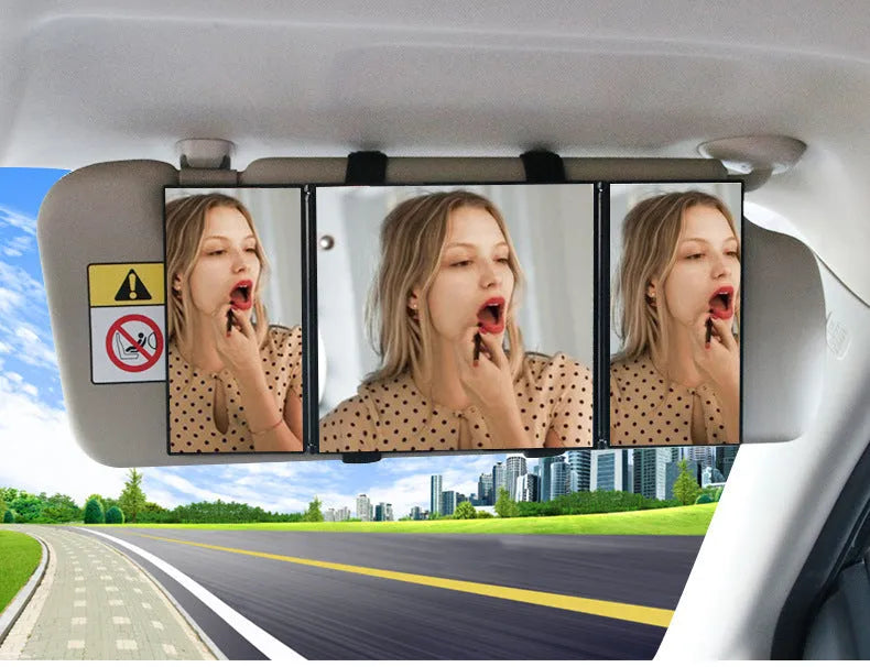 Silver folding car makeup mirror shown both closed and open on a car visor.