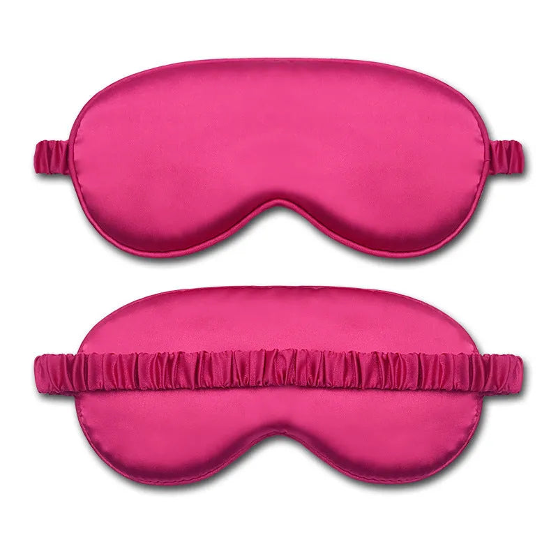 Rayon satin double-sided sleep mask in a selection of solid colours on a white background.
