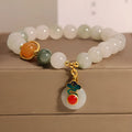 Women's ice jade bracelet with pearl accents and carved jade buckle clasp