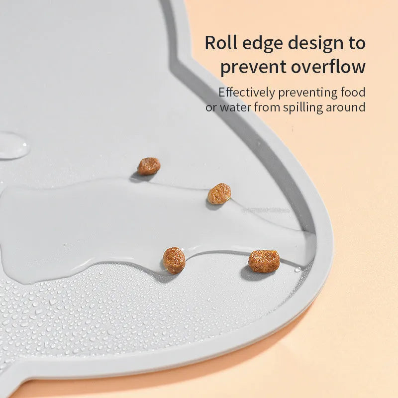 Cat head shaped silicone pet feeding mat in solid colour measuring 44cm by 24cm