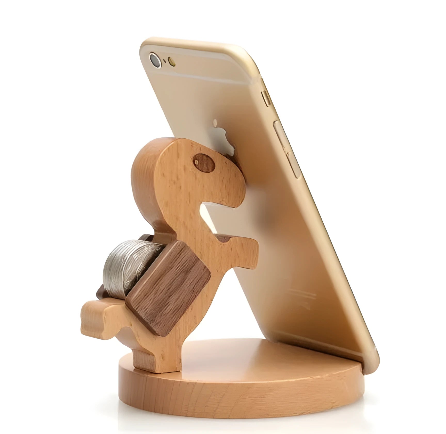 Solid beech wood phone holder with resin puppy decoration and a pound coin in the integrated slot.
