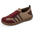 Retro German training shoes with fly knit mesh upper and polyurethane sole in black colour