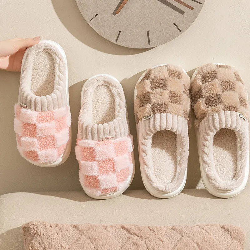 Women's plush round-toe slippers in grey, showing car suture detail and a flat PVC sole.