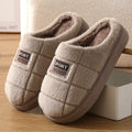 Men's plaid pattern winter slippers with rabbit hair upper and brown colourway.