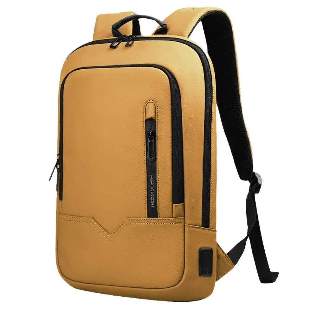 Lightweight solid colour polyester backpack with USB charging port for a laptop.