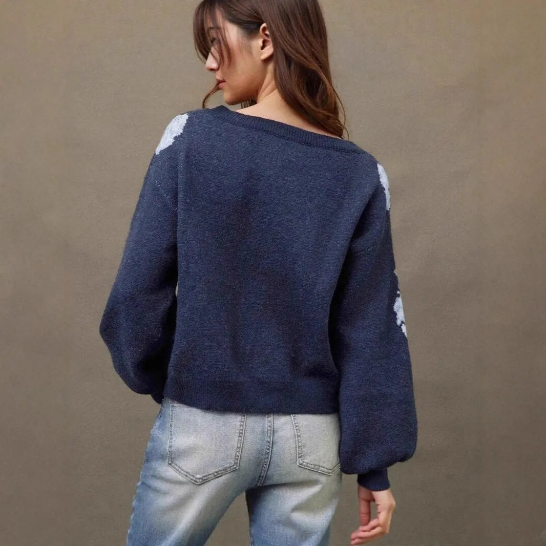Sapphire blue women's off-neck pullover with a floral jacquard pattern and long sleeves.