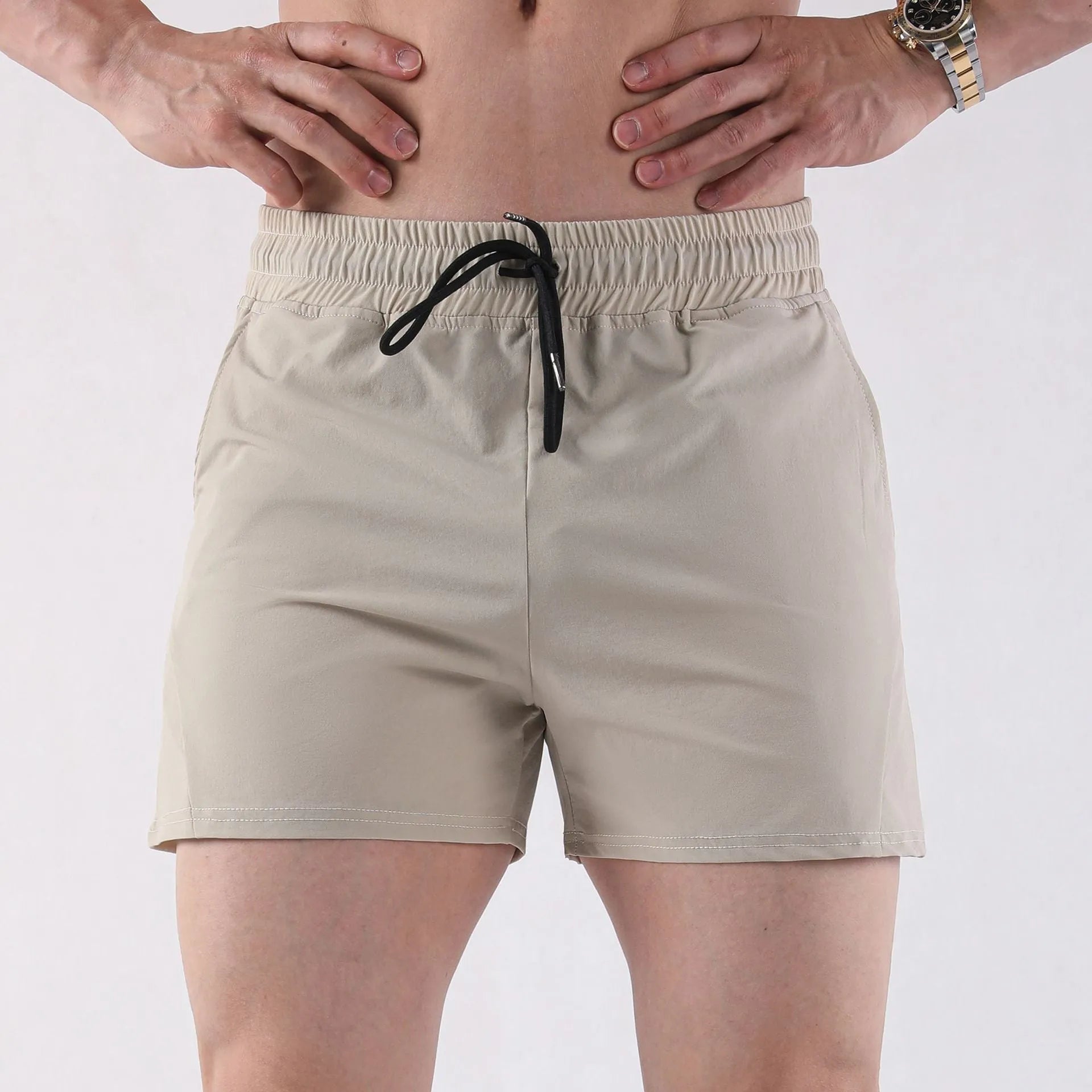 Men's thin polyester basketball shorts in grey colour with elastic waistband for summer sports