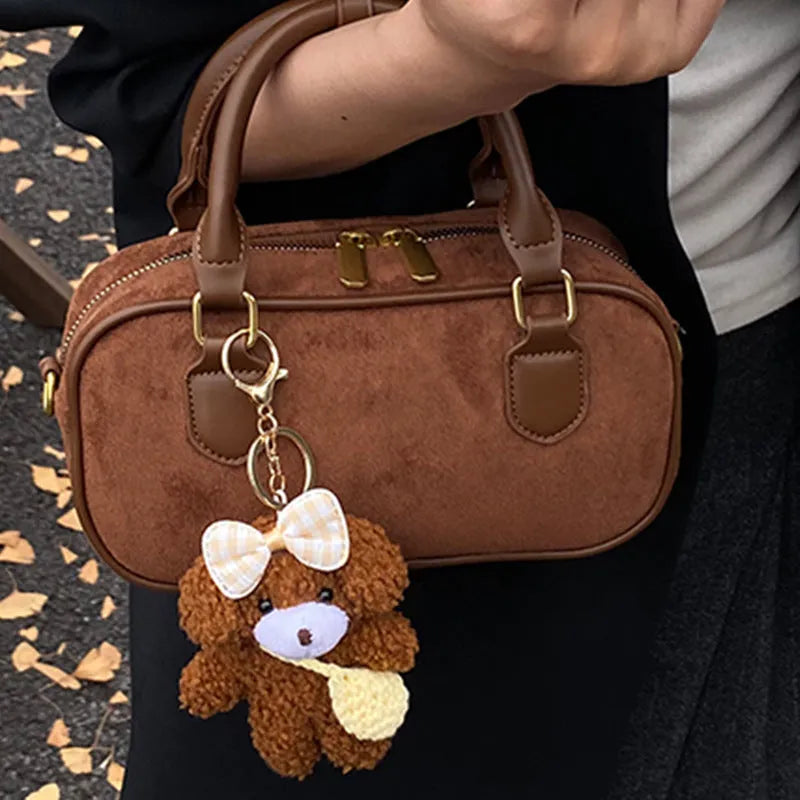 American retro PU leather bowling bag in brown with pendant and crossbody strap